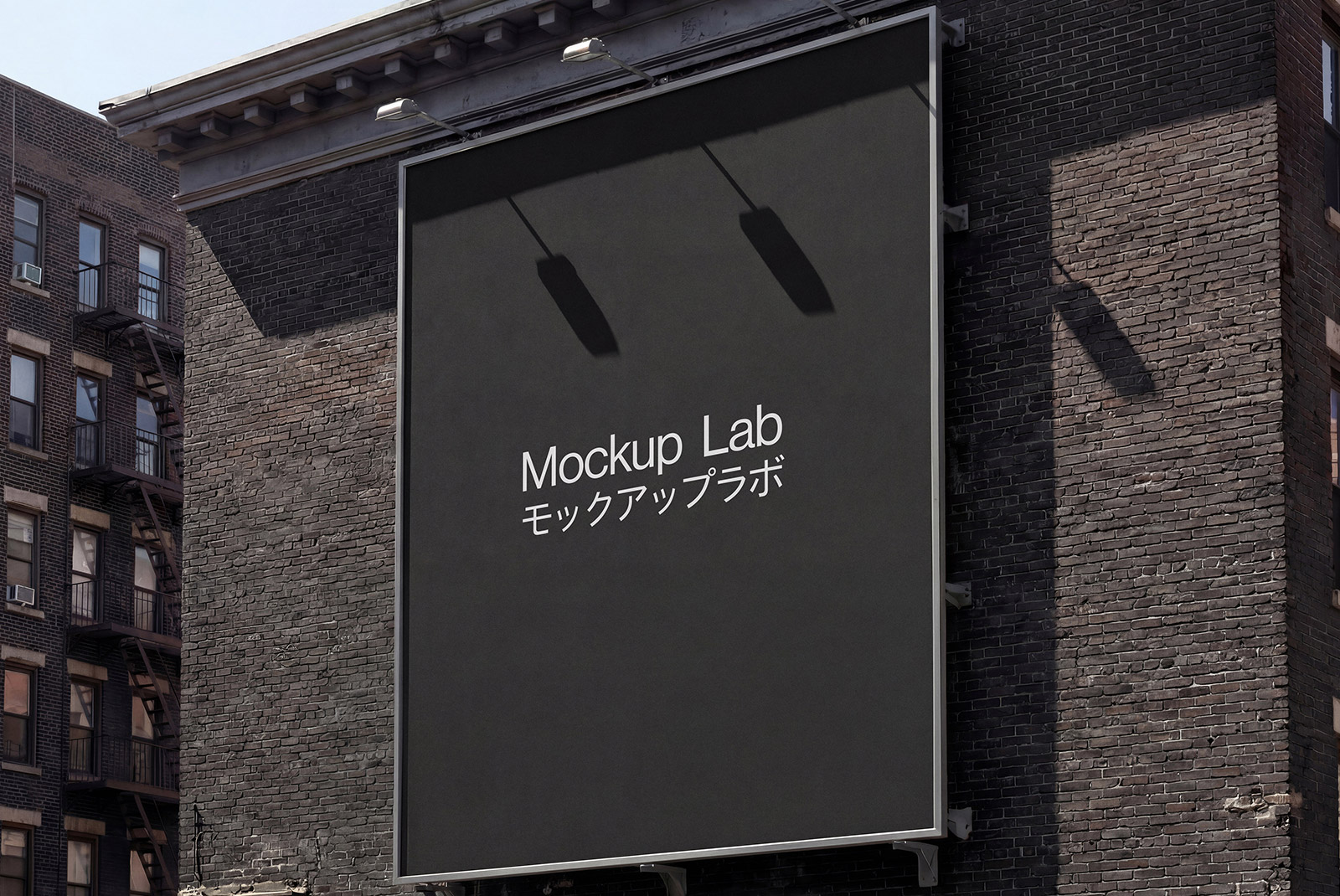 Front view of a large billboard mockup displaying a vibrant advertisement against a clear sky.